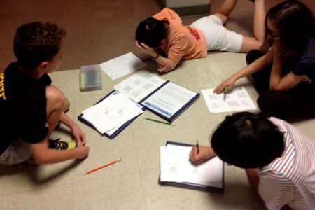 students-studying-on-floor.jpg